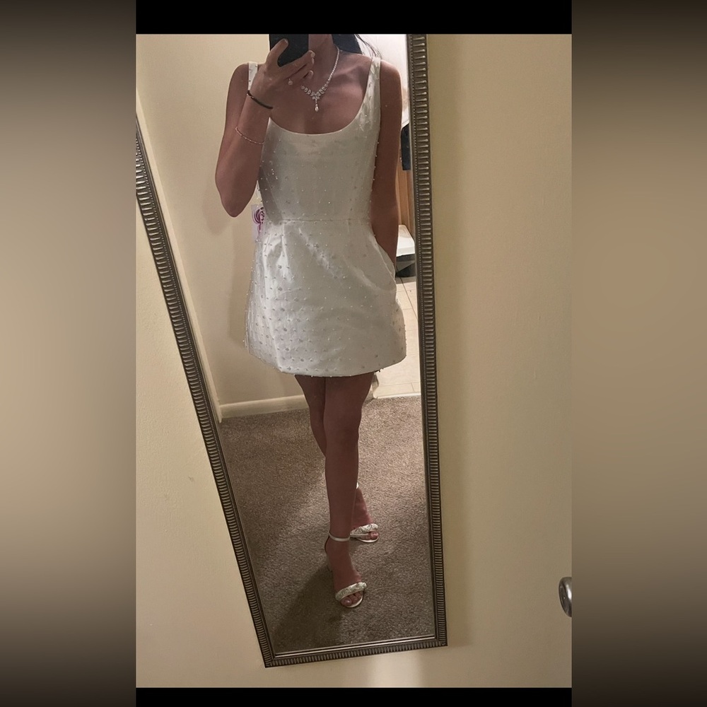 By Walter’s little white dress